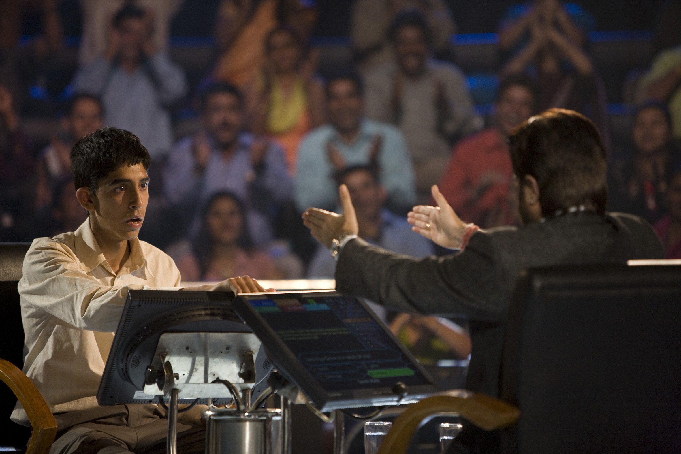 Slumdog Millionaire: The film starred Dev Patel as Jamal, and filmed in India. 2370x1580 HD Background.