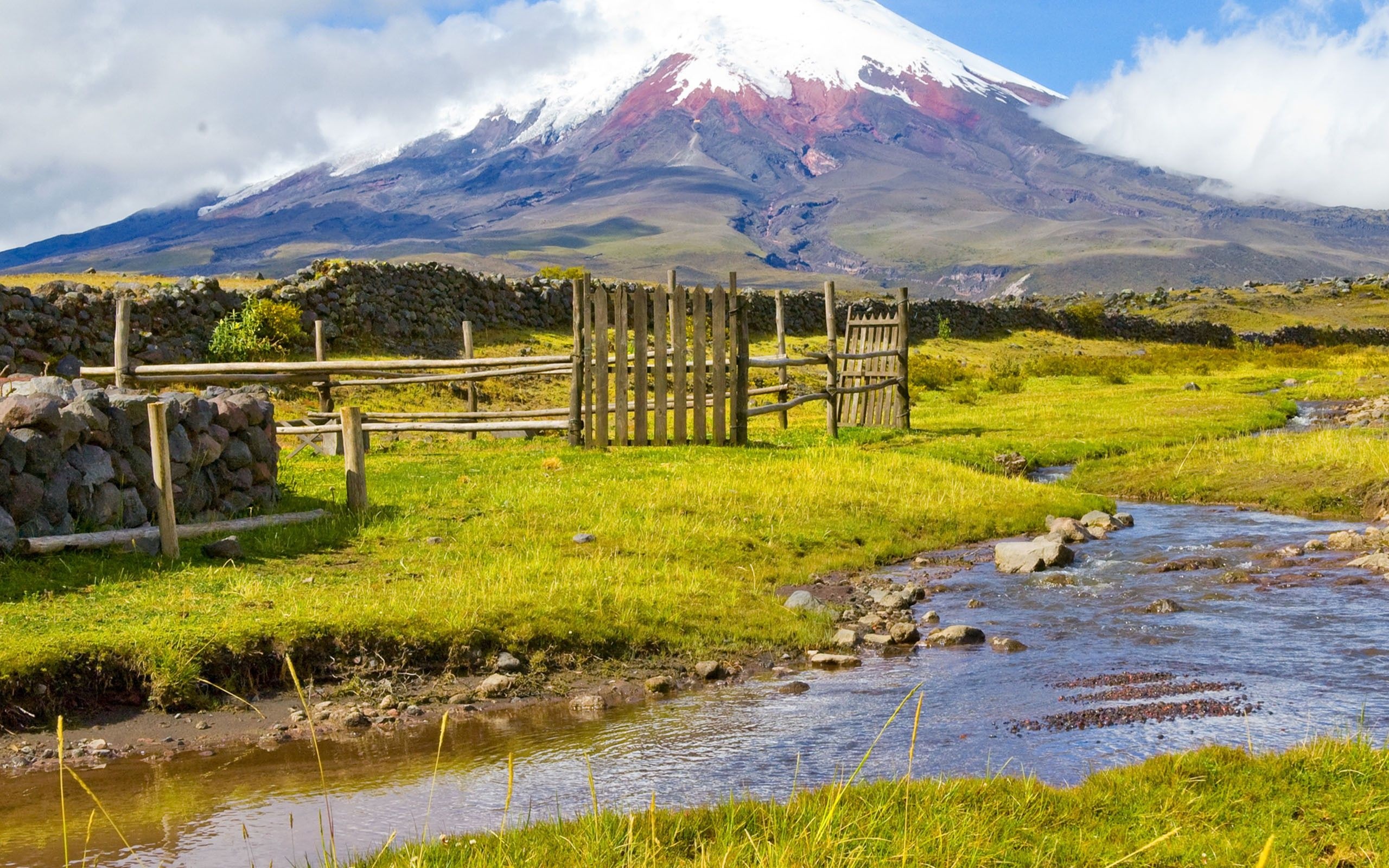 Ecuador: Part of the chain of volcanoes around the Pacific plate known as the Pacific Ring of Fire. 2560x1600 HD Background.