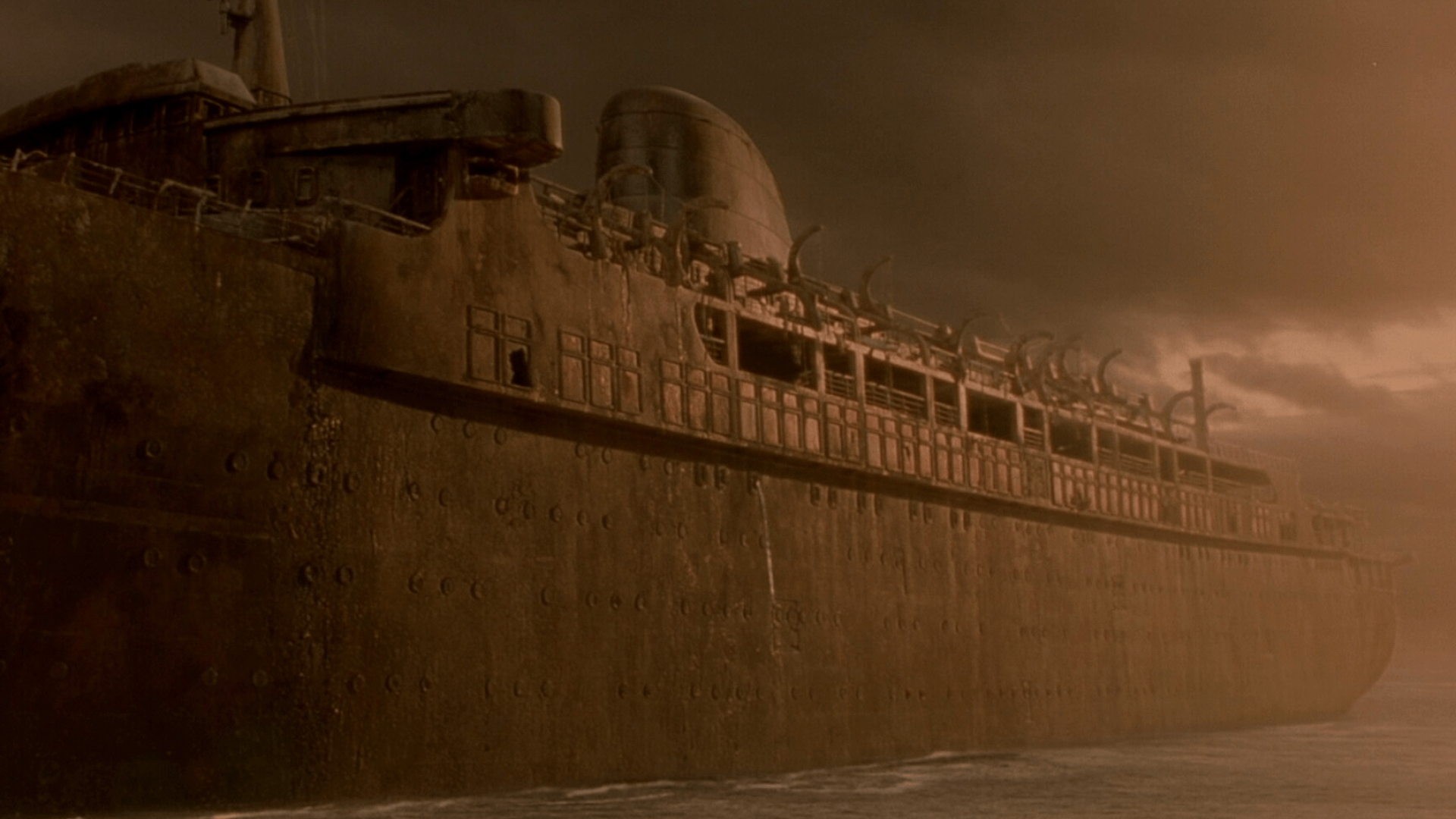 Ghost Ship: A shipwreck at the coast of the ocean, The front part of a commercial vessel. 1920x1080 Full HD Wallpaper.