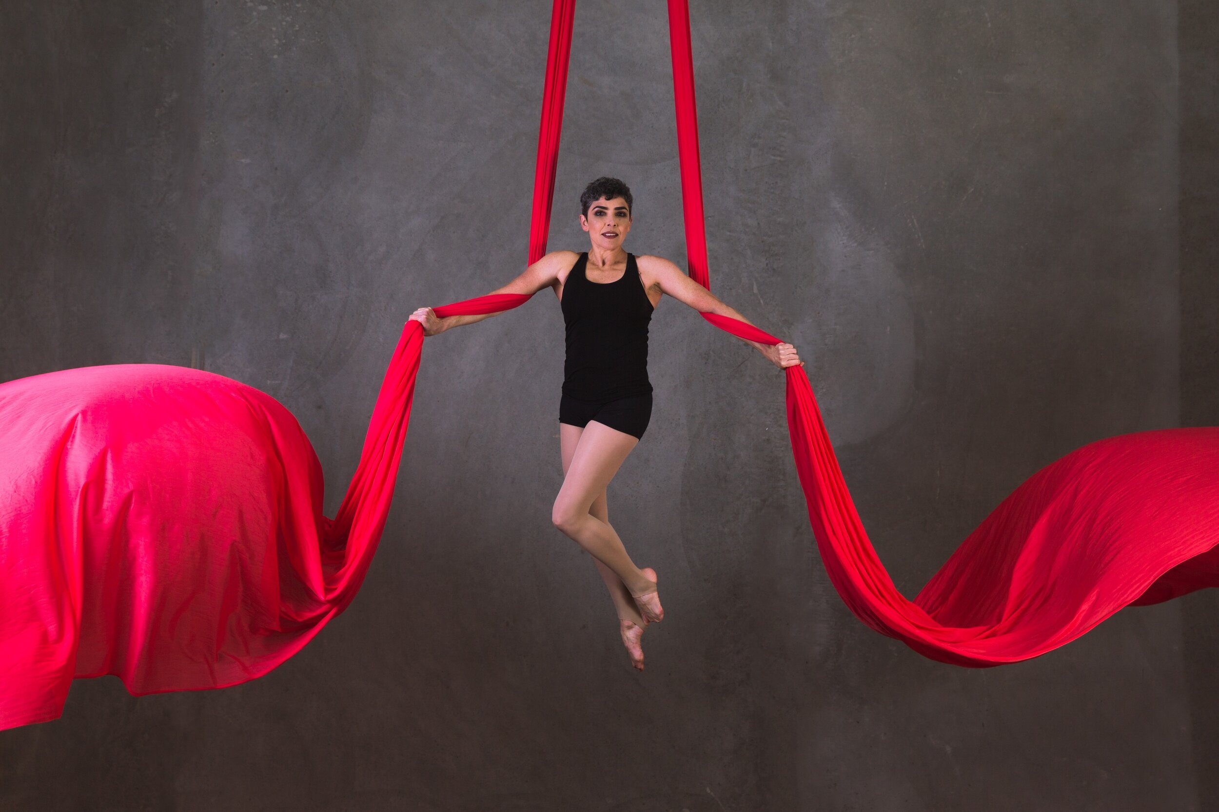 Aerial Silks: The red fabric used by a female aerialist during an artistic performance and training. 2500x1670 HD Wallpaper.