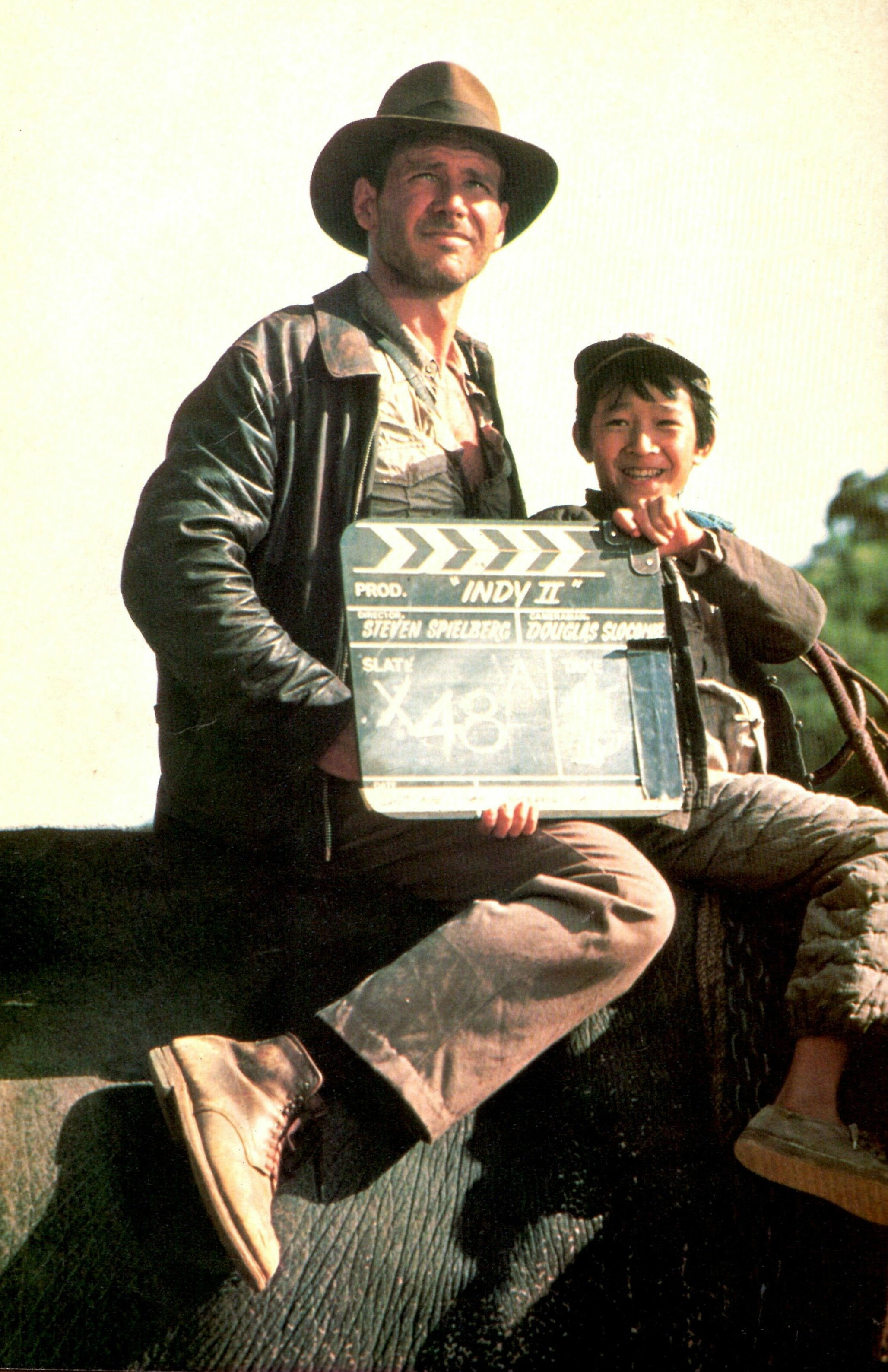 Indiana Jones: Harrison Ford, Ke Huy Quan as Short Round, A 1984 action-adventure film. 2060x3180 HD Background.