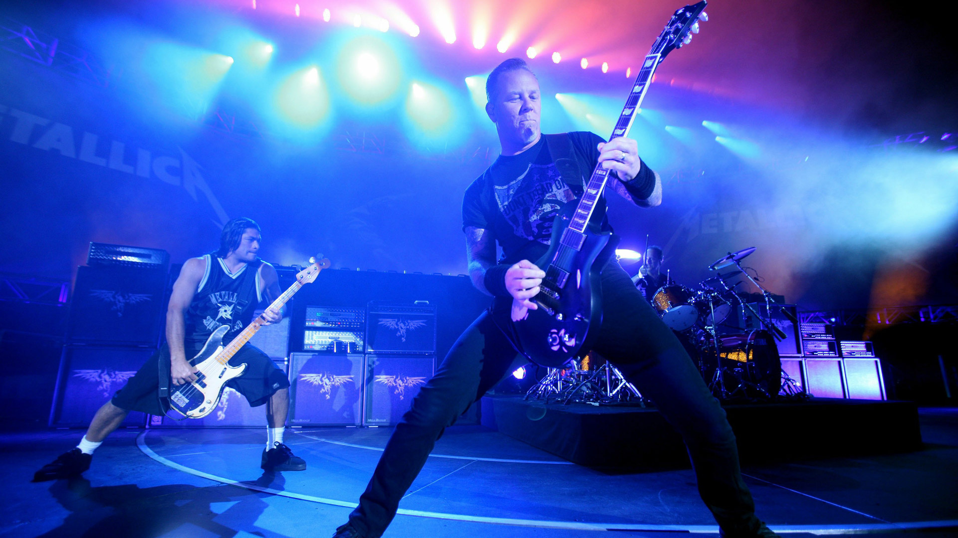 Metallica concert, Lighted guitar, Blue ambiance, James Hetfield's performance, 1920x1080 Full HD Desktop