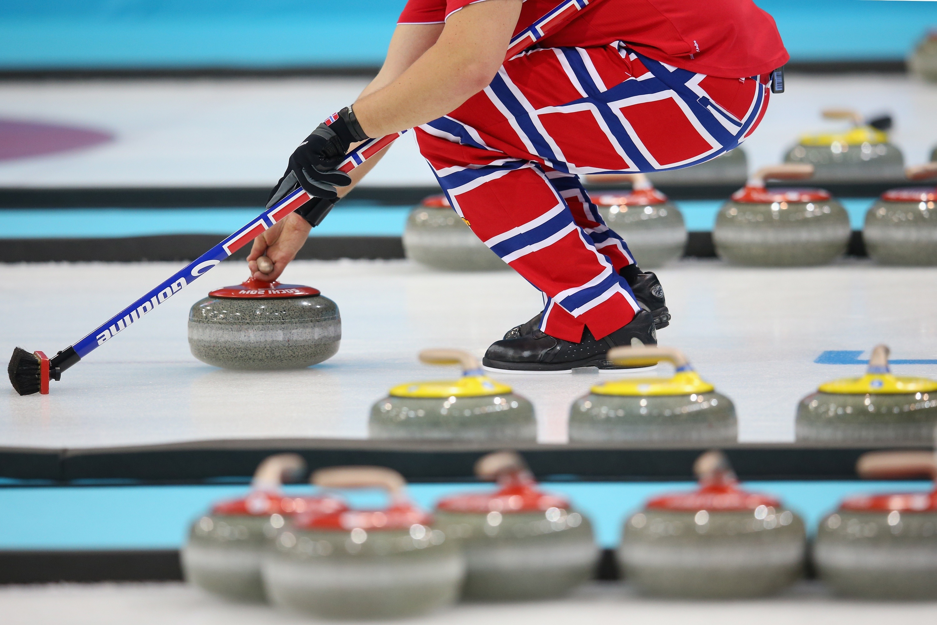 Curling: The stones which are made of granite and are specified by the World Curling Federation. 3000x2000 HD Background.
