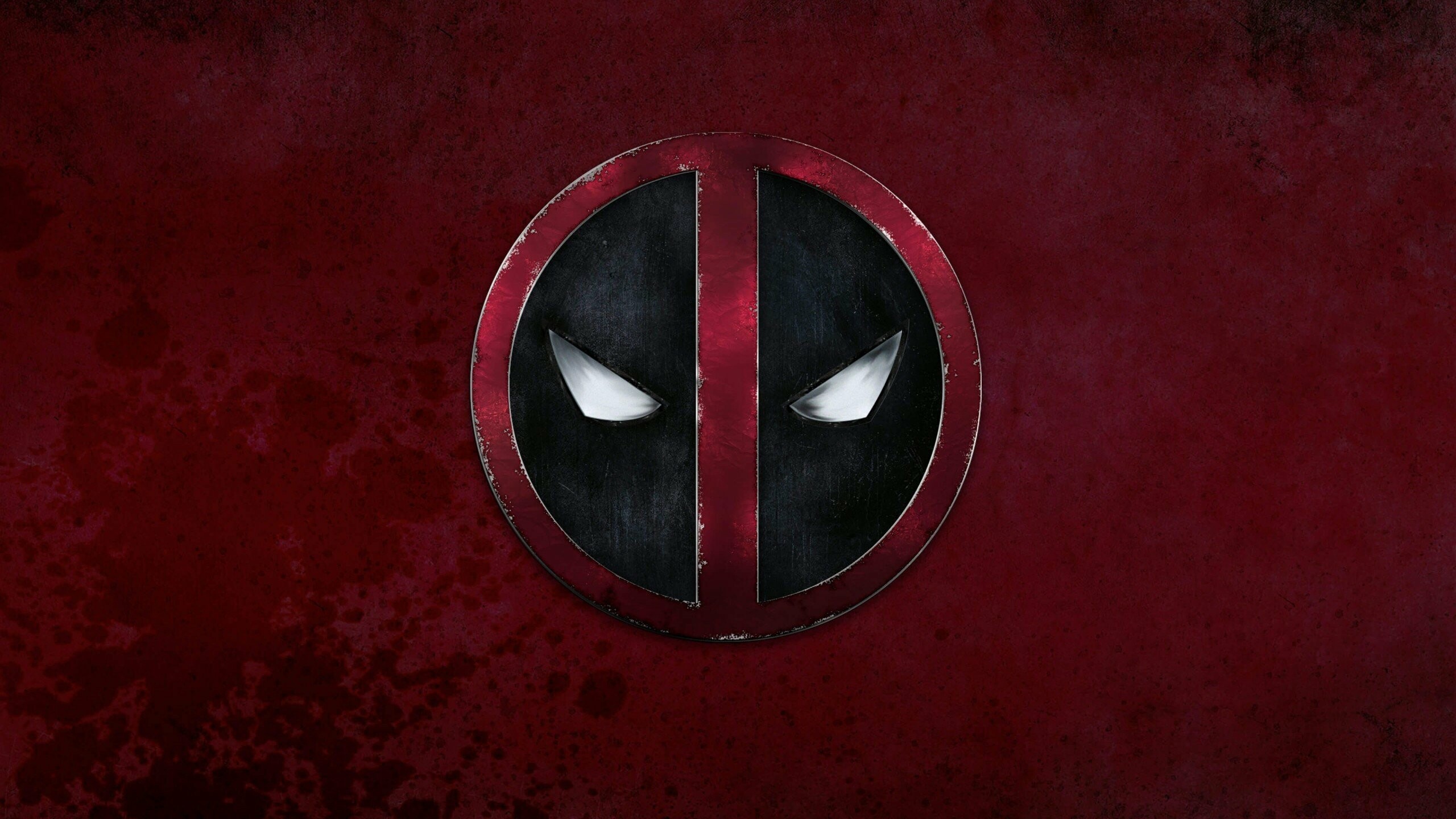 Deadpool: In the film, Wade Wilson hunts the man who gave him mutant abilities and a scarred physical appearance. 2560x1440 HD Background.
