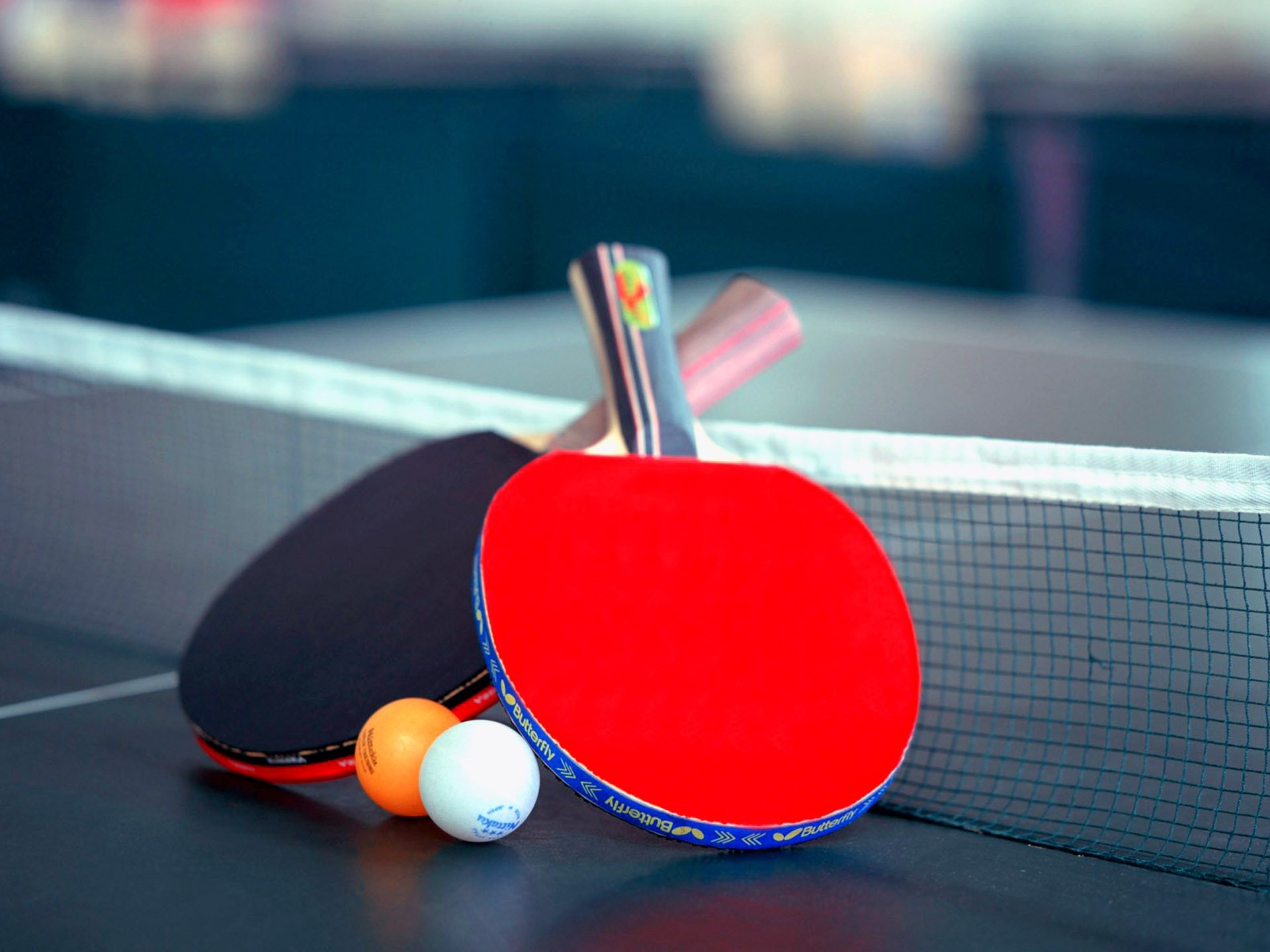 Table Tennis: Ping-pong table with a net, Rackets and plastic balls, Ping-pong equipment. 1920x1440 HD Background.
