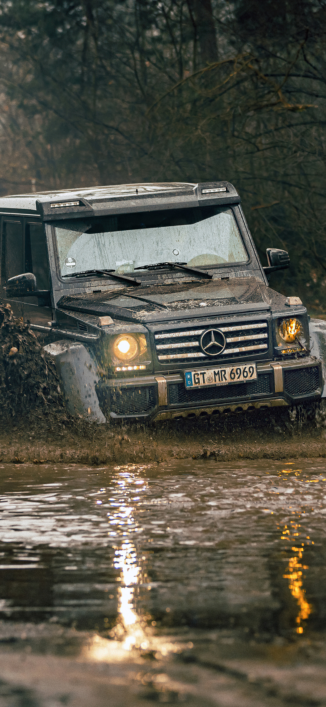 Off-road Driving: Mercedes G500 4x4 Offroading, Original G-wagen, 17.2 inches of ground clearance. 1130x2440 HD Background.