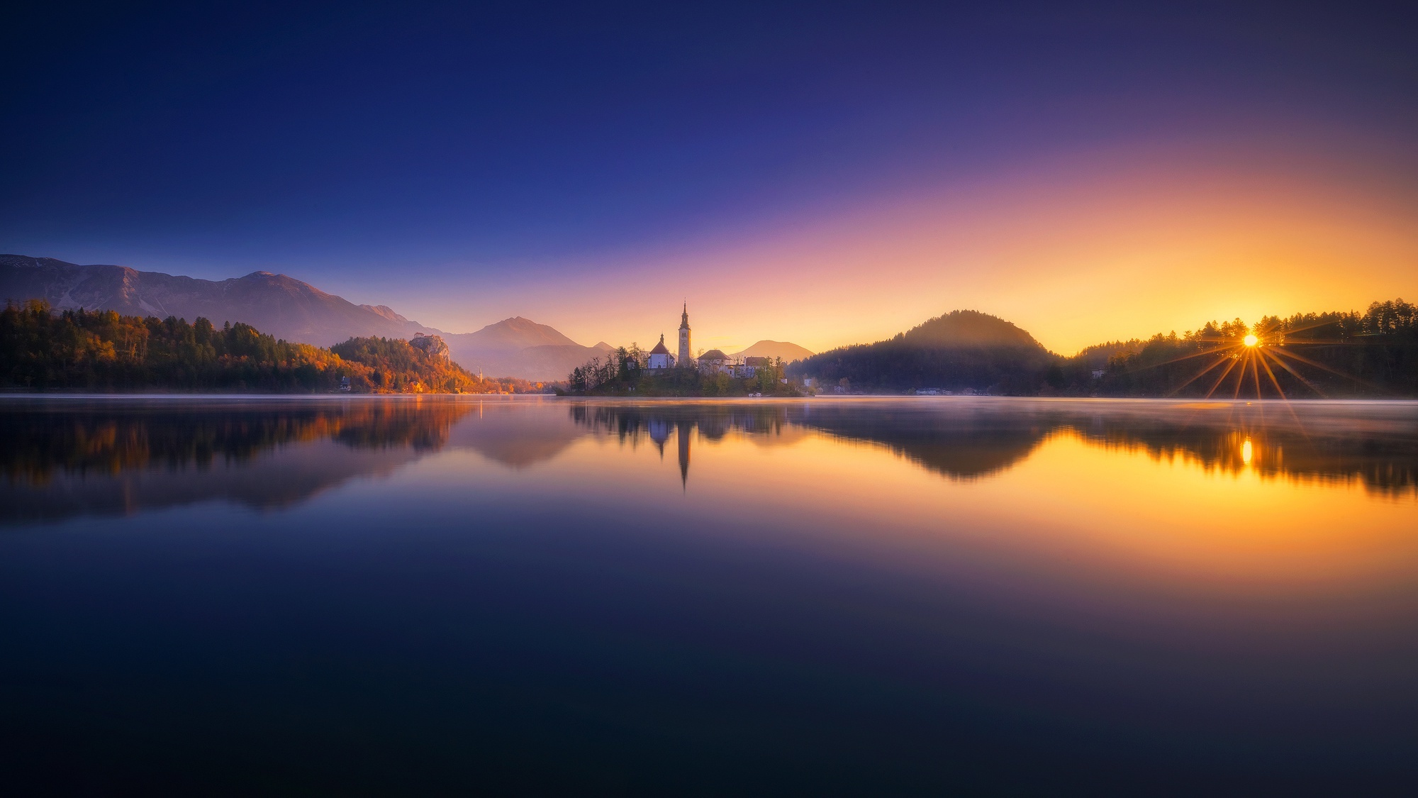 Lake Bled, Nature's beauty, Sunrise reflection, Slovenian charm, 2000x1130 HD Desktop