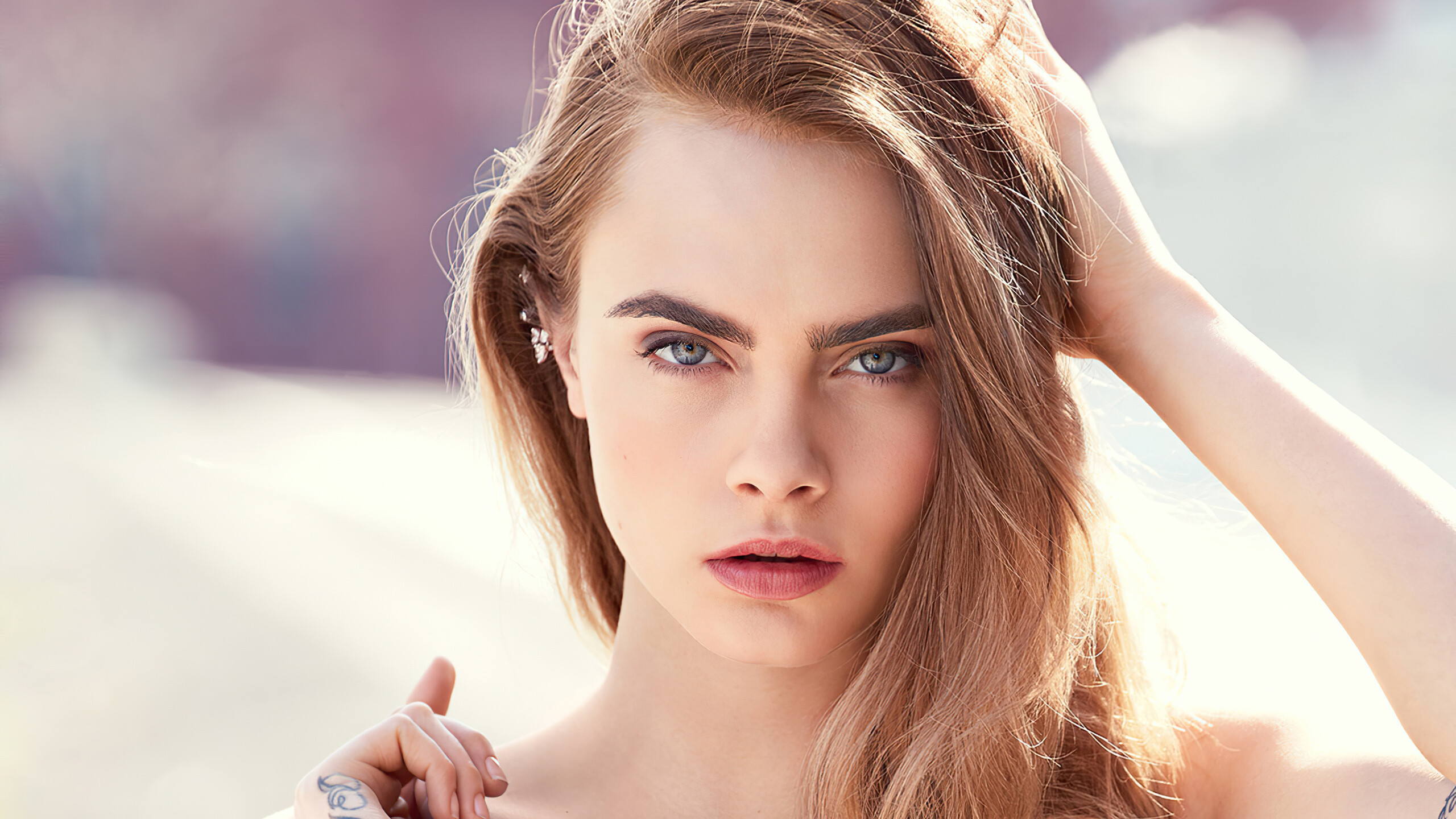 Cara Delevingne: A fashion model, The face of Burberry's Beauty campaign. 2560x1440 HD Wallpaper.
