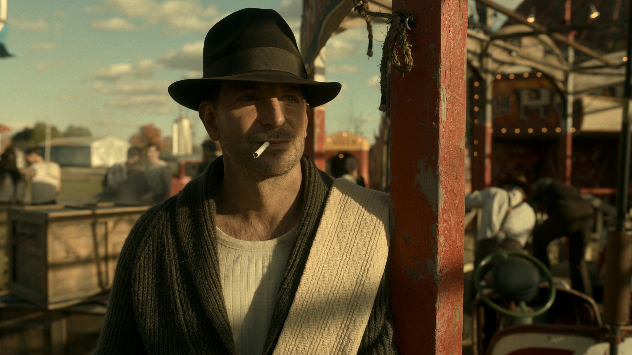Nightmare Alley: The film stars Bradley Cooper as a charming and ambitious carnival worker. 2560x1440 HD Background.