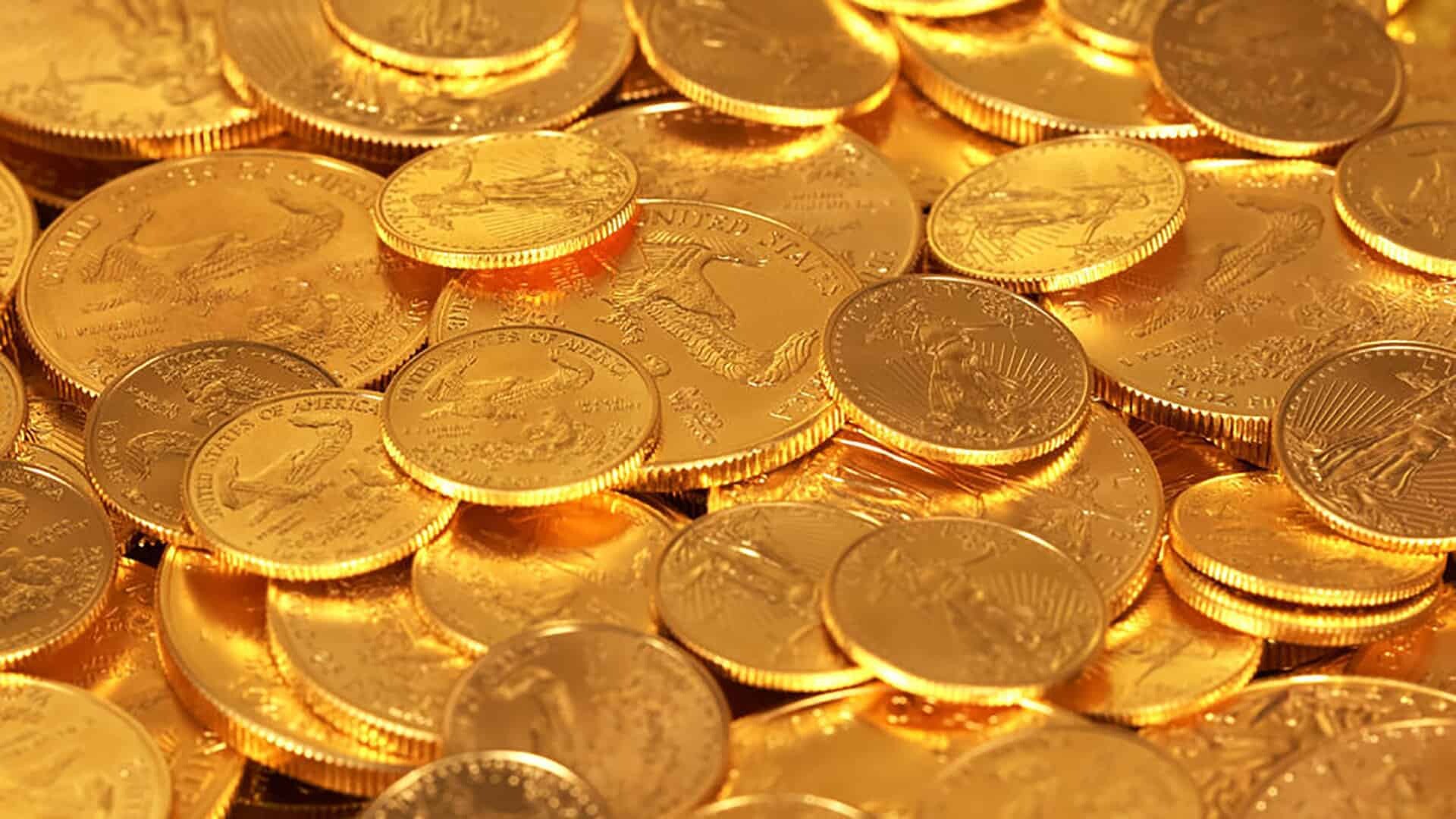 Gold Coins: Scattering of metallic money, A medium of exchange or legal tender, Yellow metal. 1920x1080 Full HD Background.