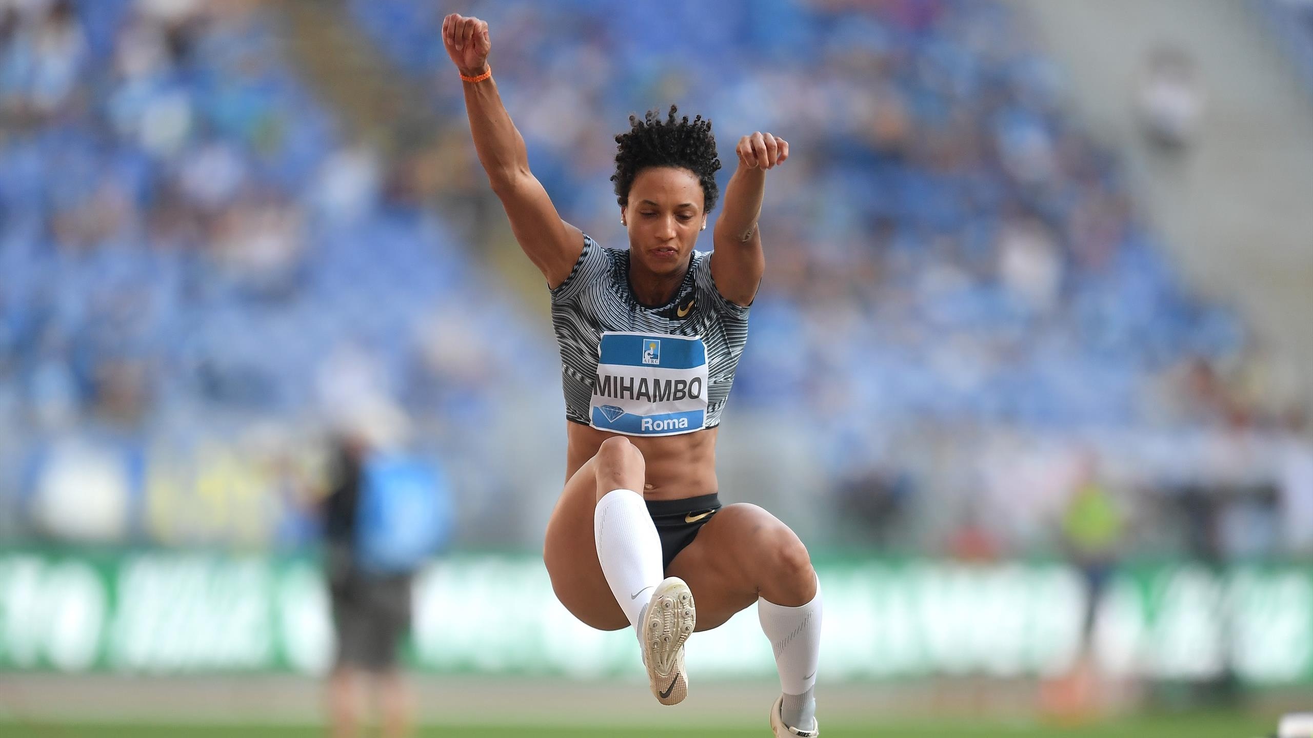 Malaika Mihambo, Rising star, Track and field prowess, Sports recognition, 2560x1440 HD Desktop