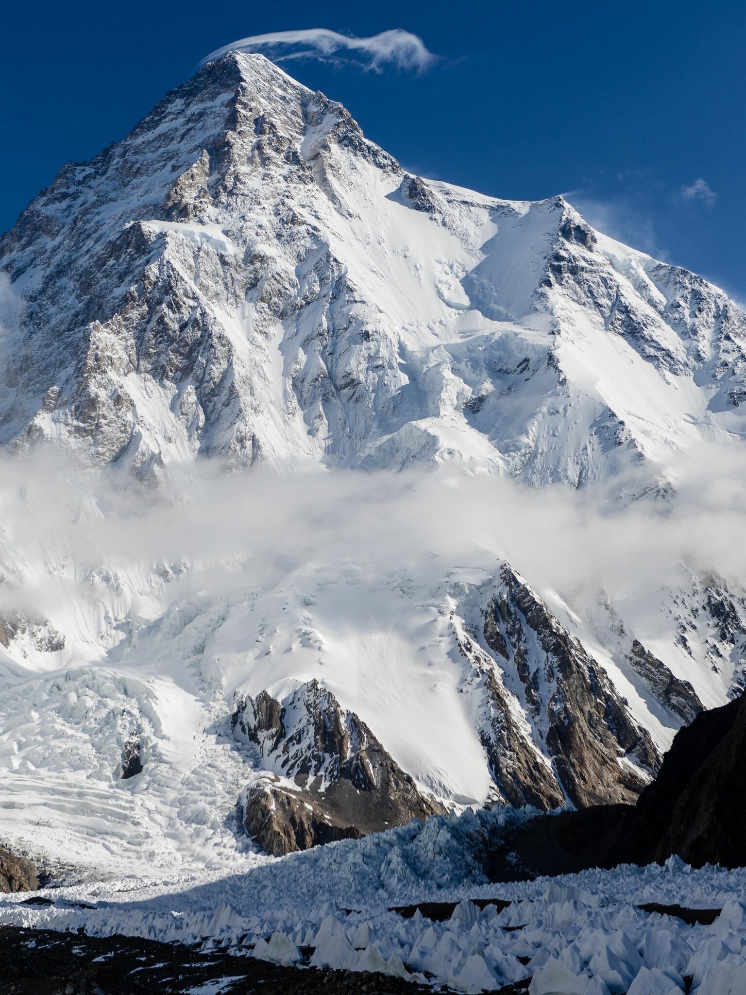 Mount Everest: The China–Nepal border, Earth's highest mountain above sea level. 1540x2050 HD Background.