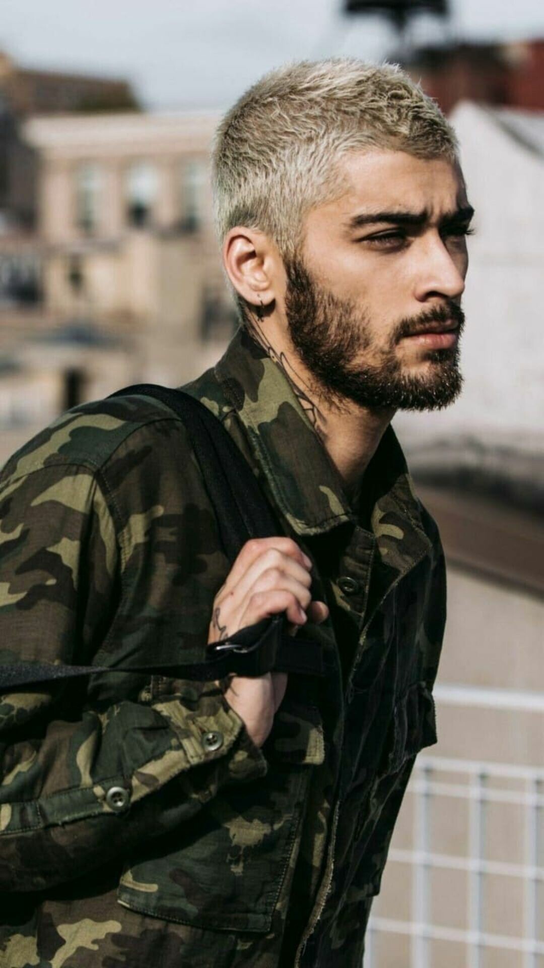 Zayn Malik: Won the Billboard Music Award for New Artist of the Year twice, as a member of One Direction and again as a soloist. 1080x1920 Full HD Background.