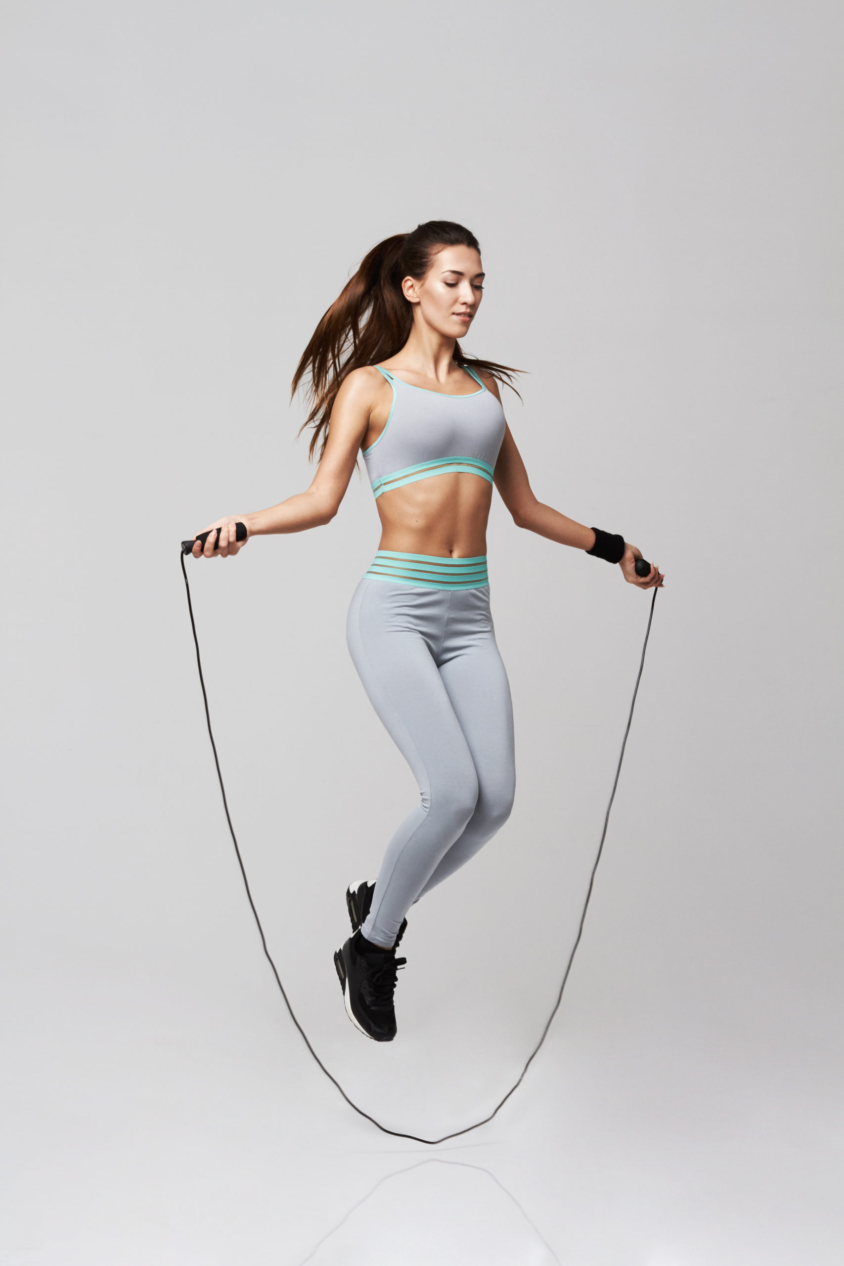 Rope Jumping: Fitness clothing and activewear, Jumping, Athletic body, Simple training. 1710x2560 HD Background.