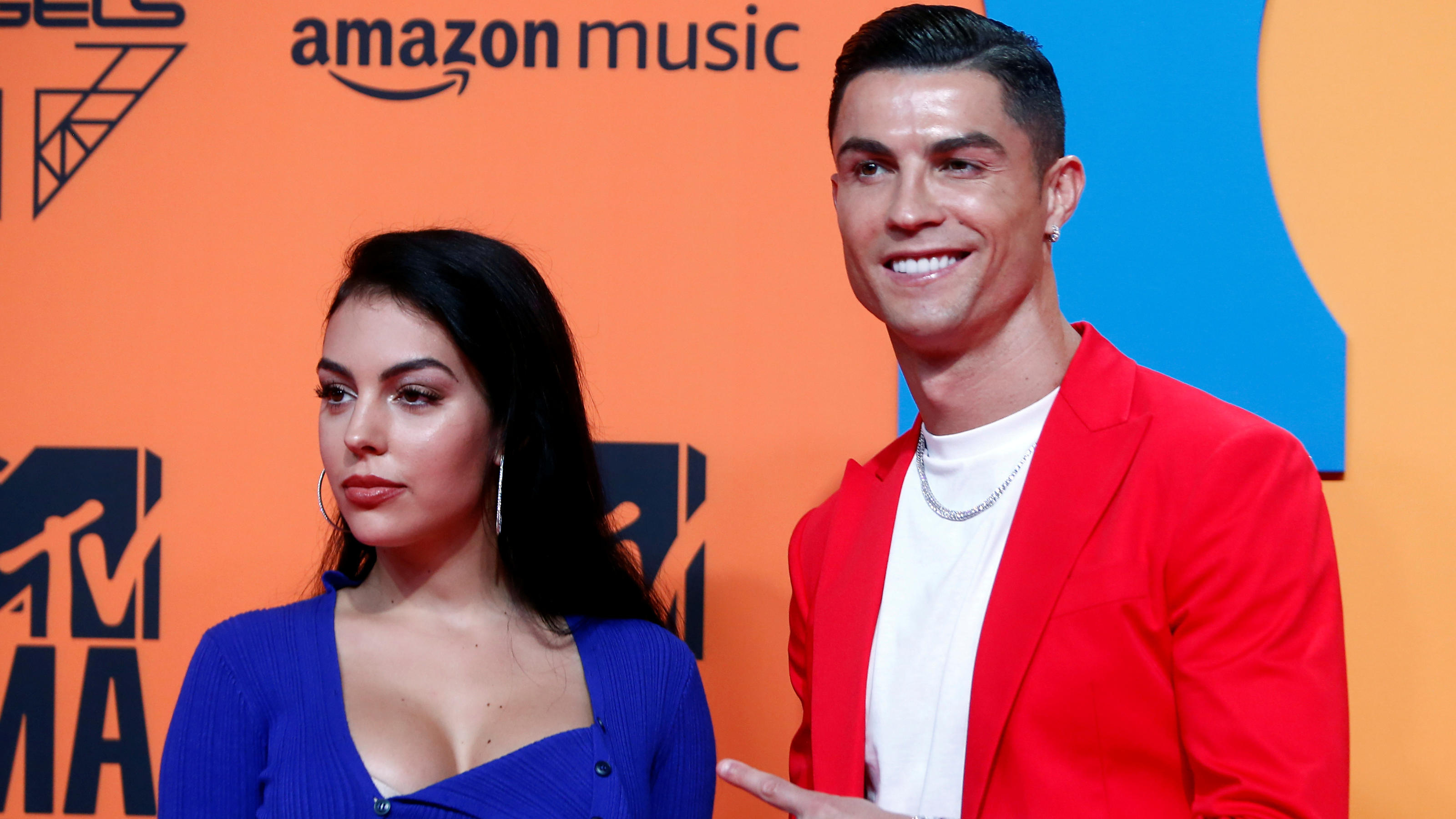 Cristiano Ronaldo and Georgina Rodriguez: Spanish social media influencer, Known for relationship with football megastar. 3200x1800 HD Wallpaper.