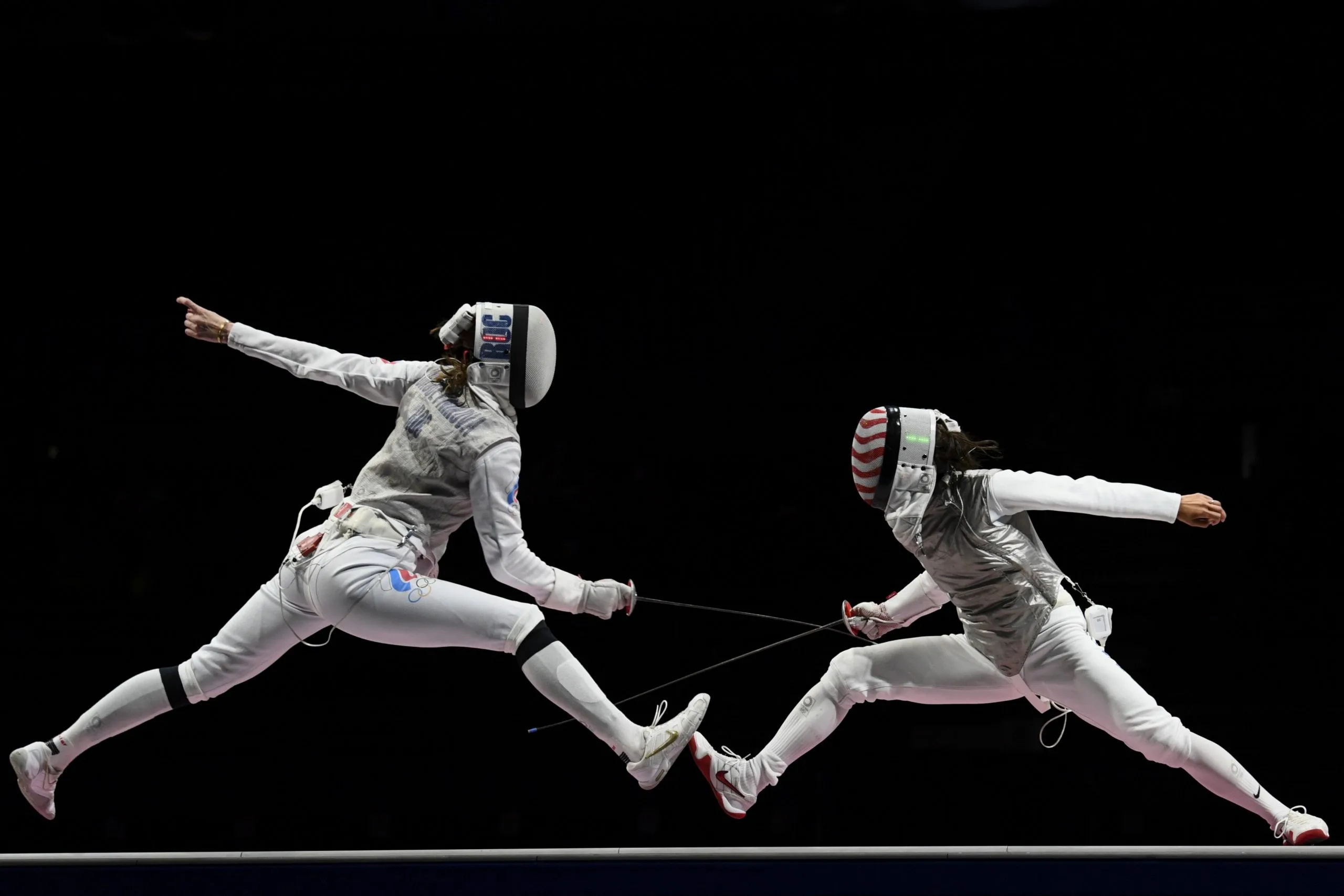 Fencing: Larisa Korobeynikova vs. Lee Kiefer, The 2020 Tokyo Summer Olympics. 2560x1710 HD Background.