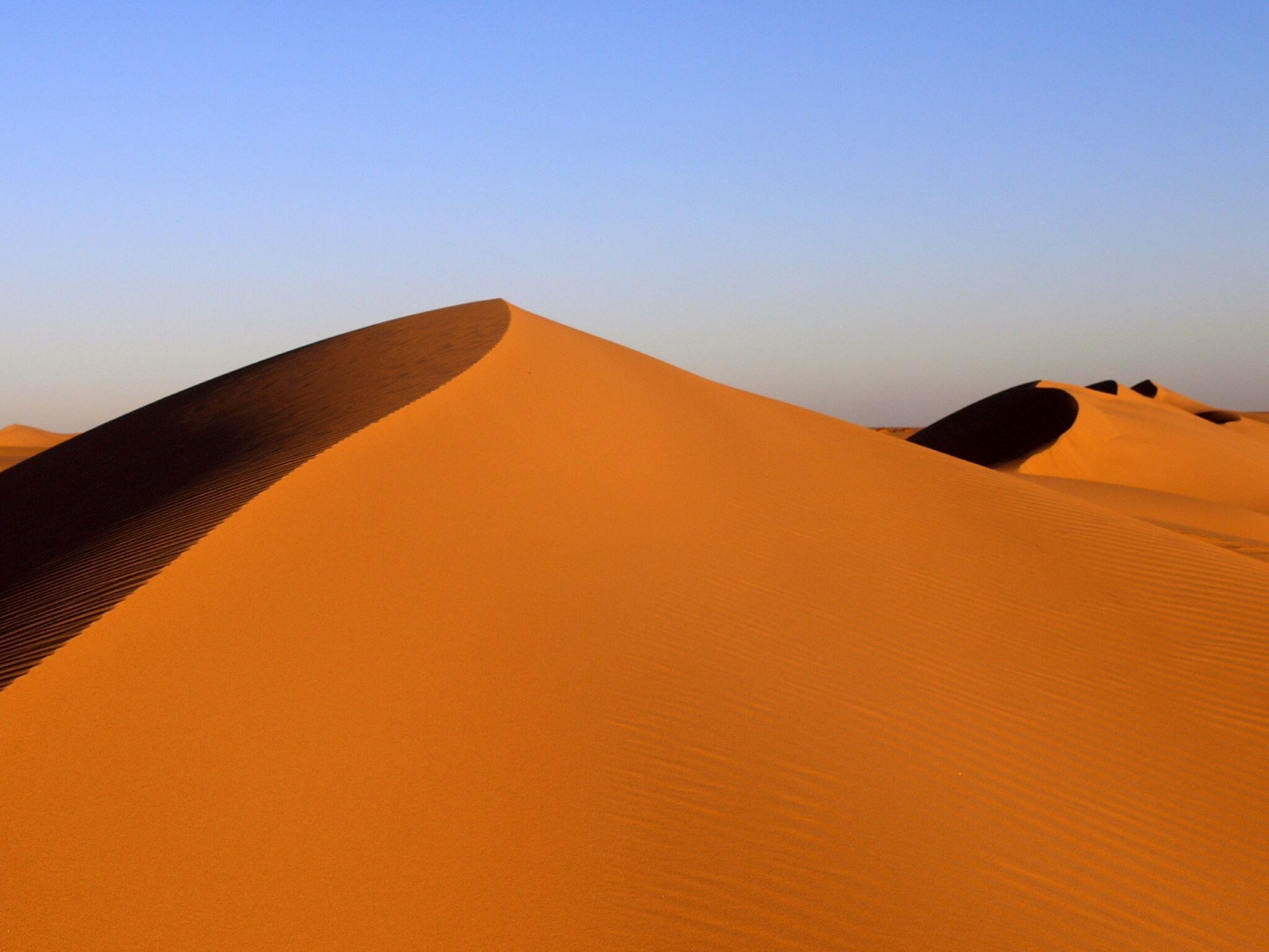 Desert: Deserts are also classified, according to their geographical location and dominant weather pattern, as trade wind, mid-latitude, rain shadow, coastal, monsoon, or polar deserts. 2050x1540 HD Background.