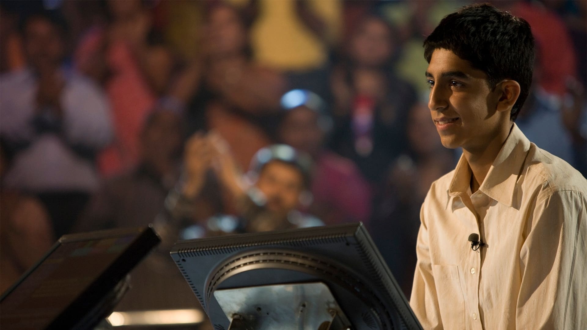 Slumdog Millionaire: Dev Patel as Jamal Malik, a boy born and raised in the poverty of Bombay. 1920x1080 Full HD Wallpaper.