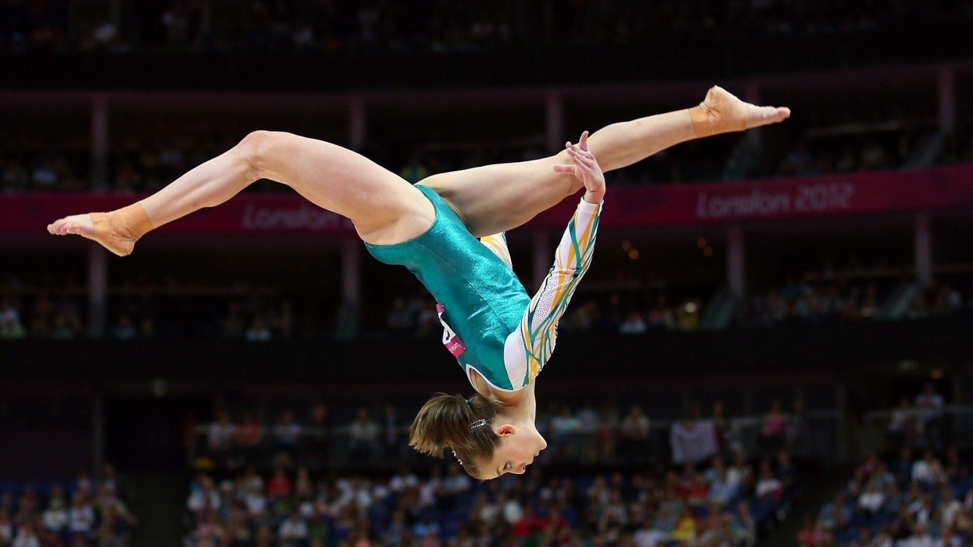 Acrobatic Gymnastics: A back-flip jump performed by a professional gymnast at the 2012 Summer Olympics. 1920x1080 Full HD Wallpaper.