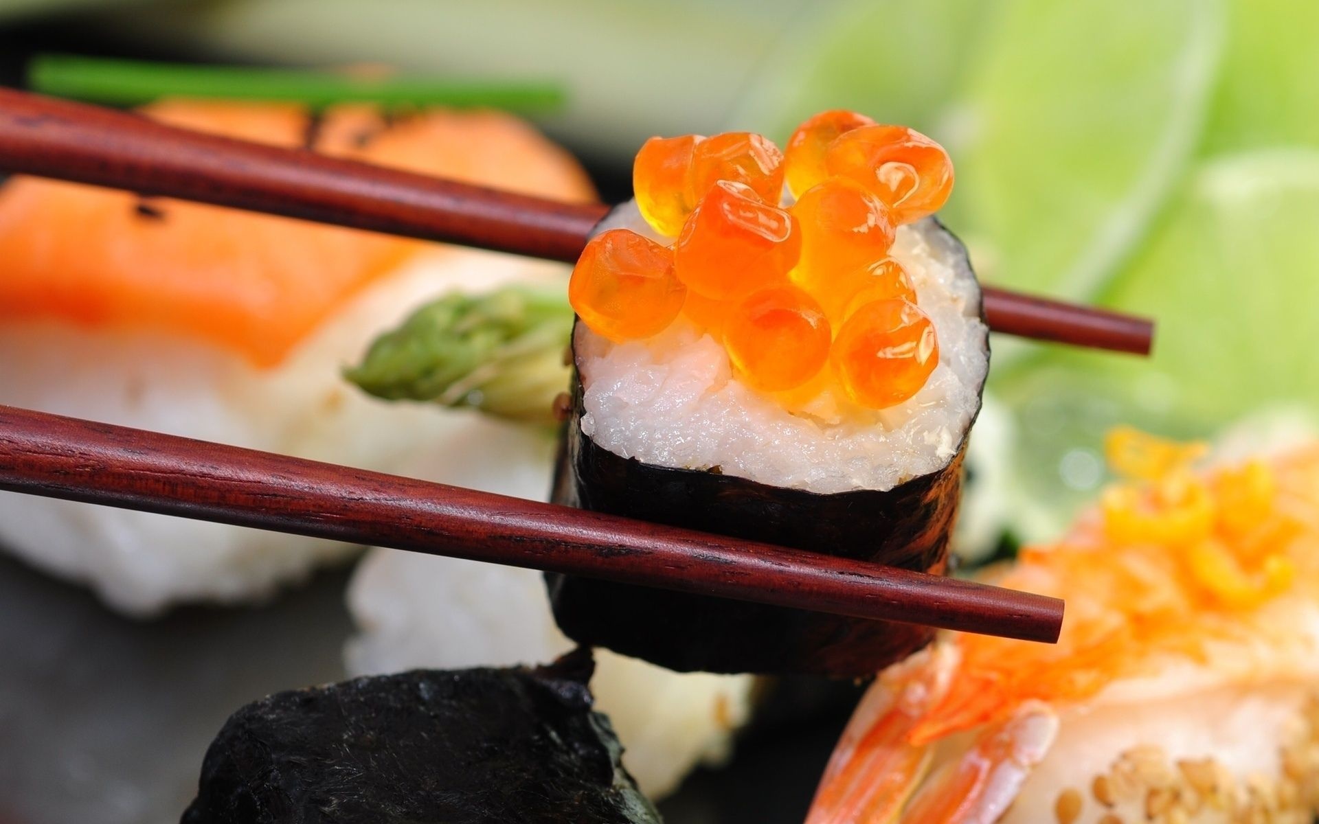 Sushi: Roll topped with caviar, Chopsticks, Eating utensils spread throughout East and Southeast Asia. 1920x1200 HD Background.